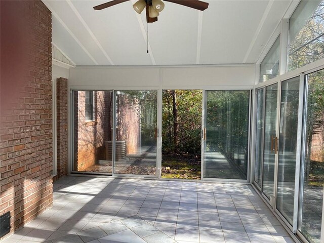229 Smithstone Path, Fayetteville, GA 30214 - unfurnished sunroom with plenty of natural light, vaulted ceiling, and a ceiling fan