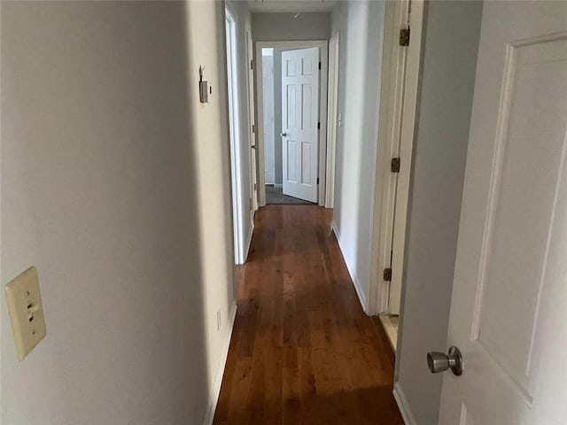229 Smithstone Path, Fayetteville, GA 30214 - hall with attic access, baseboards, and dark wood-type flooring