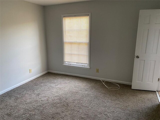 229 Smithstone Path, Fayetteville, GA 30214 - carpeted empty room featuring baseboards
