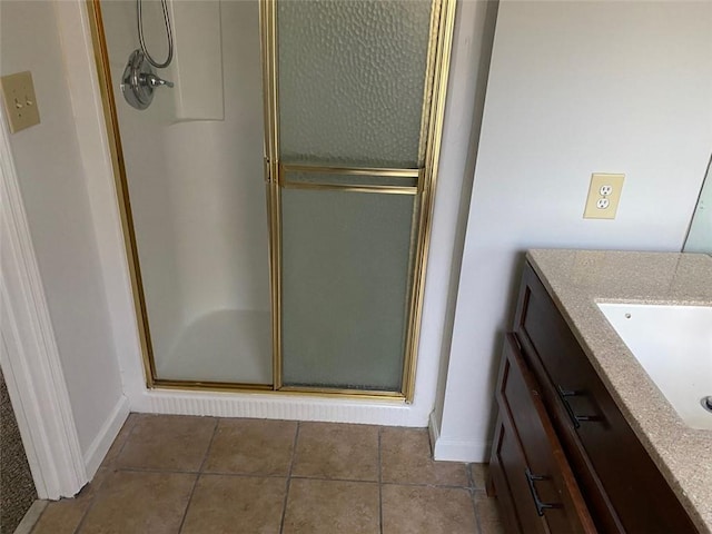 229 Smithstone Path, Fayetteville, GA 30214 - bathroom featuring baseboards, a stall shower, vanity, and tile patterned floors
