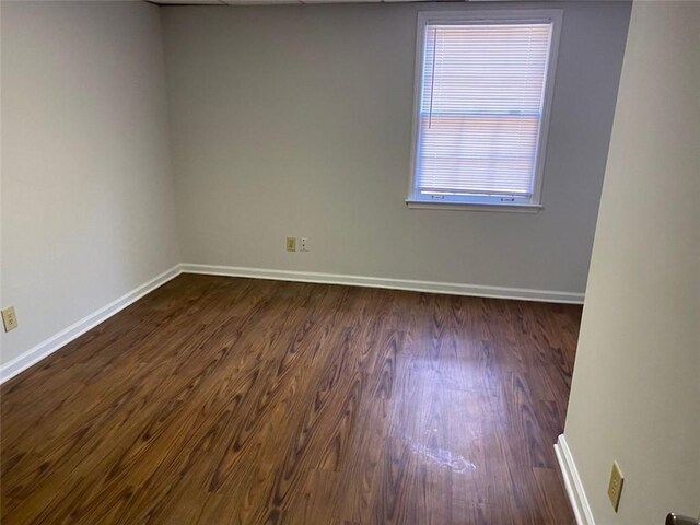 229 Smithstone Path, Fayetteville, GA 30214 - spare room with dark wood finished floors and baseboards