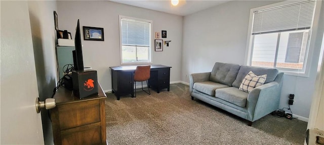 carpeted office featuring a healthy amount of sunlight and baseboards