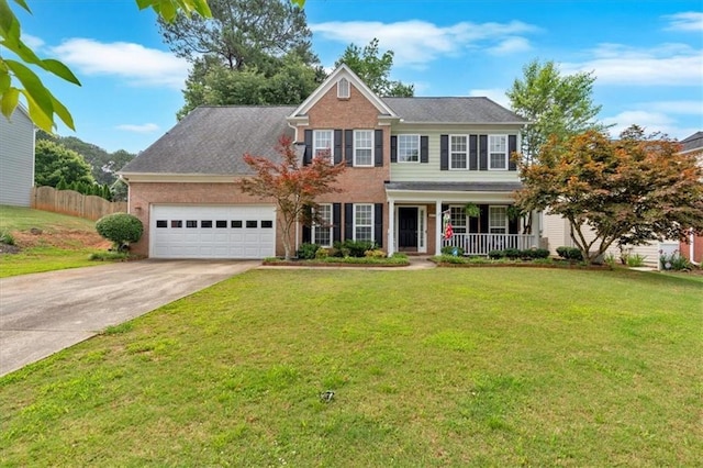 812 Roget Way, Lawrenceville, GA 30045 - colonial house with a porch, a garage, driveway, and brick siding