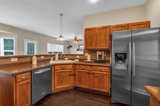 812 Roget Way, Lawrenceville, GA 30045 - kitchen with stainless steel appliances, a sink, brown cabinetry, and a ceiling fan