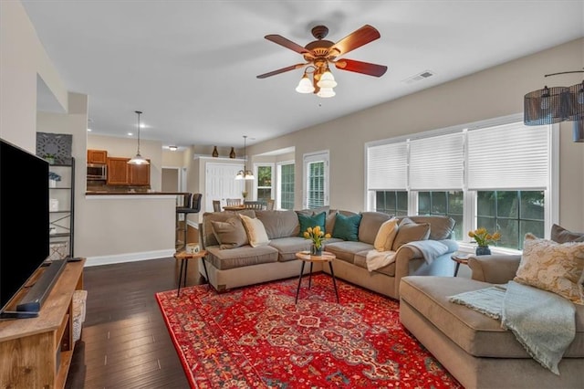 812 Roget Way, Lawrenceville, GA 30045 - living room featuring dark wood-style floors, a ceiling fan, and baseboards