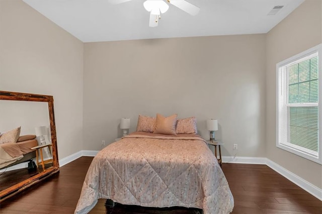 812 Roget Way, Lawrenceville, GA 30045 - bedroom featuring dark wood-style flooring, baseboards, and a ceiling fan