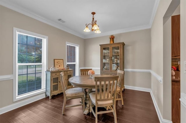 812 Roget Way, Lawrenceville, GA 30045 - dining space with a chandelier, dark wood-style flooring, ornamental molding, and baseboards