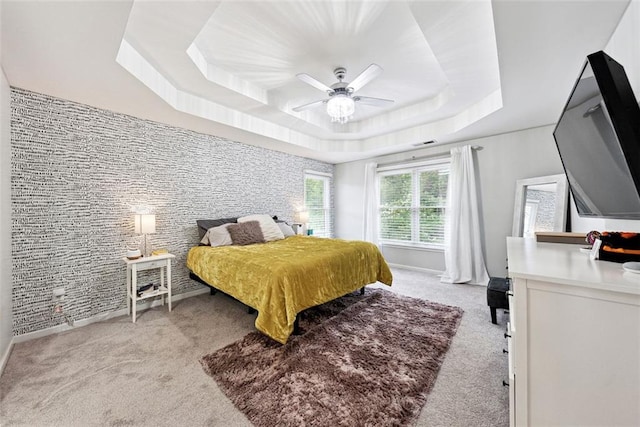 402 Homestead Dr, Dallas, GA 30157 - carpeted bedroom with a tray ceiling and a ceiling fan