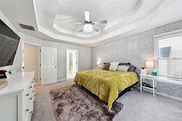 402 Homestead Dr, Dallas, GA 30157 - bedroom featuring light colored carpet, a raised ceiling, and a ceiling fan