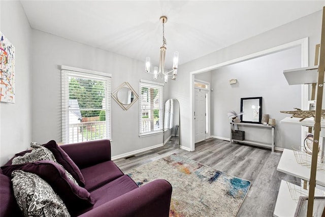 402 Homestead Dr, Dallas, GA 30157 - living room featuring a chandelier, wood finished floors, and washer / clothes dryer