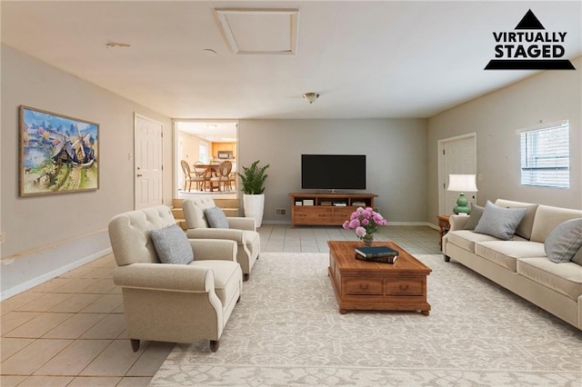 living room featuring light tile patterned floors