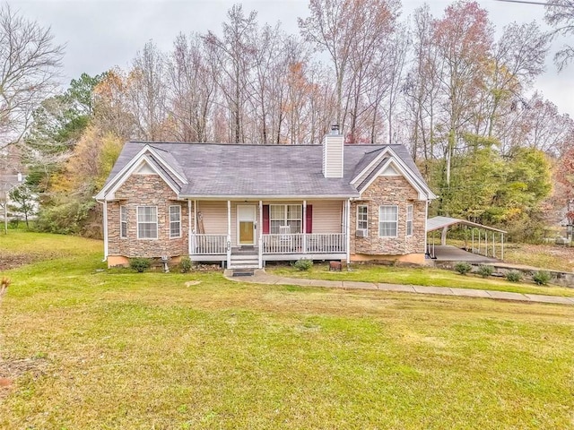 single story home featuring a porch and a front lawn