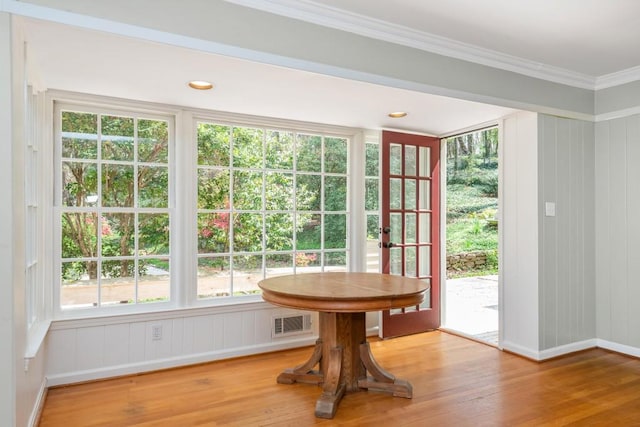 6795 Brandon Mill Rd, Atlanta, GA 30328 - unfurnished dining area featuring wood finished floors, crown molding, and baseboards
