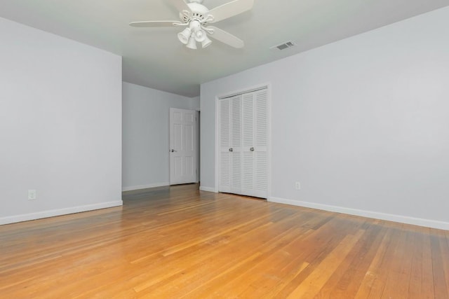6795 Brandon Mill Rd, Atlanta, GA 30328 - unfurnished bedroom with baseboards, light wood-type flooring, and a closet