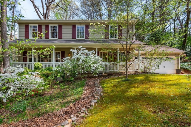 6795 Brandon Mill Rd, Atlanta, GA 30328 - view of front of home featuring a porch, a front yard, and an attached garage