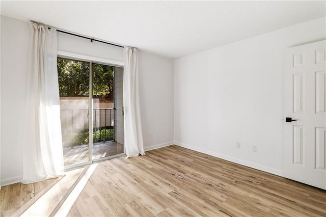 empty room featuring light hardwood / wood-style floors