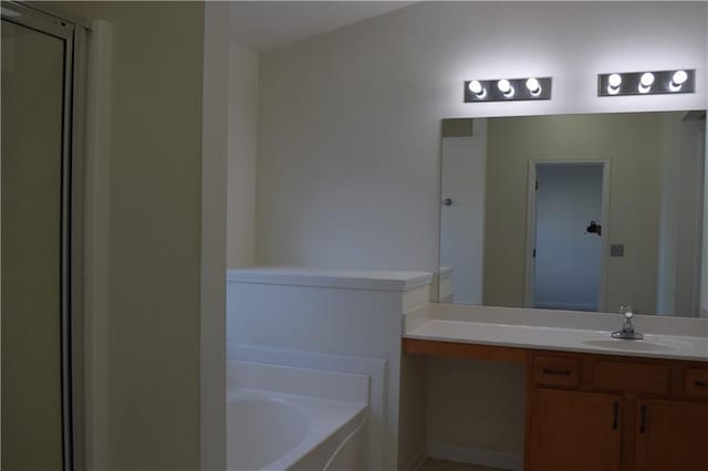 2955 Briaroak Dr, Duluth, GA 30096 - bathroom with vanity, a bath, and a shower stall