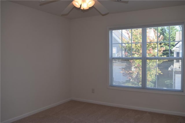 2955 Briaroak Dr, Duluth, GA 30096 - spare room featuring light colored carpet, a ceiling fan, and baseboards