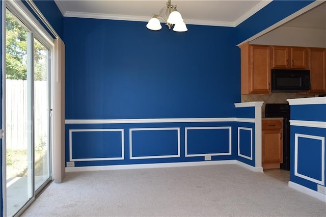 2955 Briaroak Dr, Duluth, GA 30096 - kitchen with black microwave, a chandelier, light colored carpet, tasteful backsplash, and ornamental molding