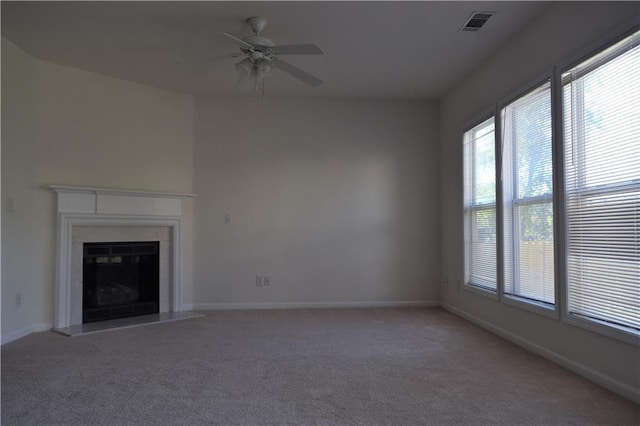 2955 Briaroak Dr, Duluth, GA 30096 - unfurnished living room featuring light carpet, a ceiling fan, baseboards, and a high end fireplace