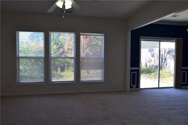 2955 Briaroak Dr, Duluth, GA 30096 - empty room featuring carpet, plenty of natural light, ceiling fan, and baseboards