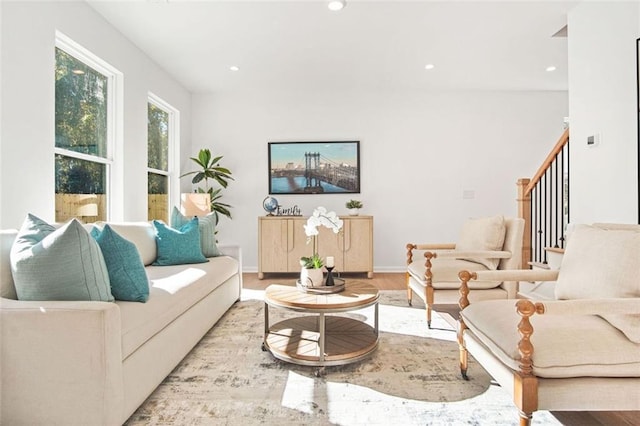 living room with light hardwood / wood-style flooring