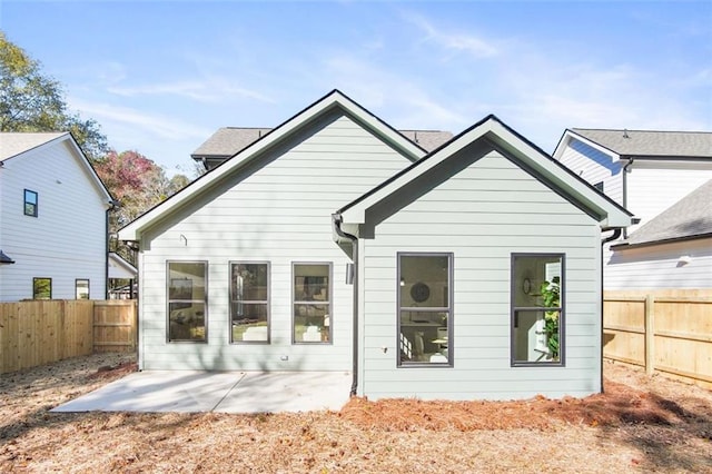 rear view of house featuring a patio area