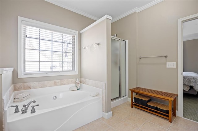 ensuite bathroom featuring a garden tub, crown molding, ensuite bathroom, a shower stall, and tile patterned floors