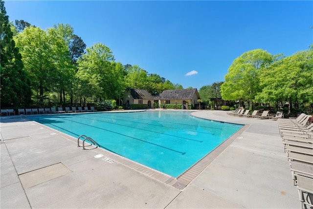 view of swimming pool featuring a patio