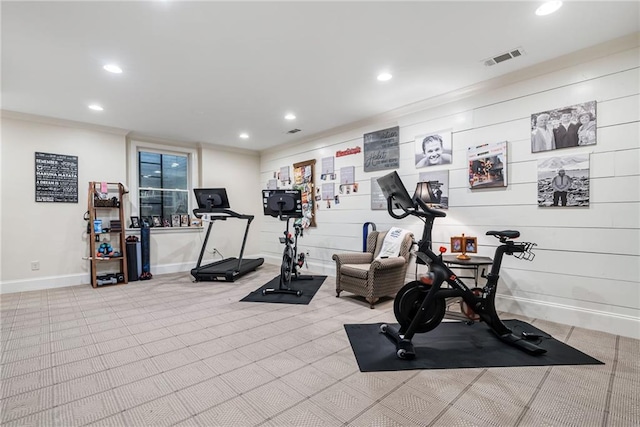 workout room featuring light colored carpet