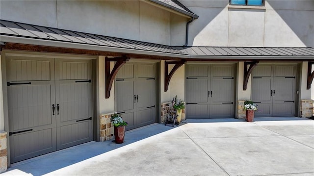 view of exterior entry with a garage