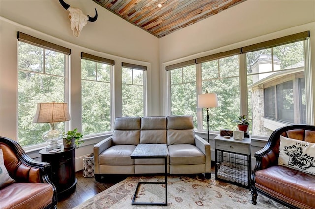 sunroom / solarium with lofted ceiling and wood ceiling