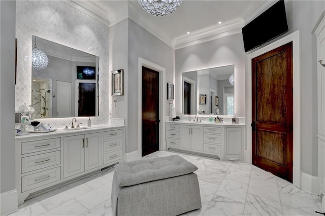 bathroom featuring a shower with door, vanity, crown molding, and an inviting chandelier