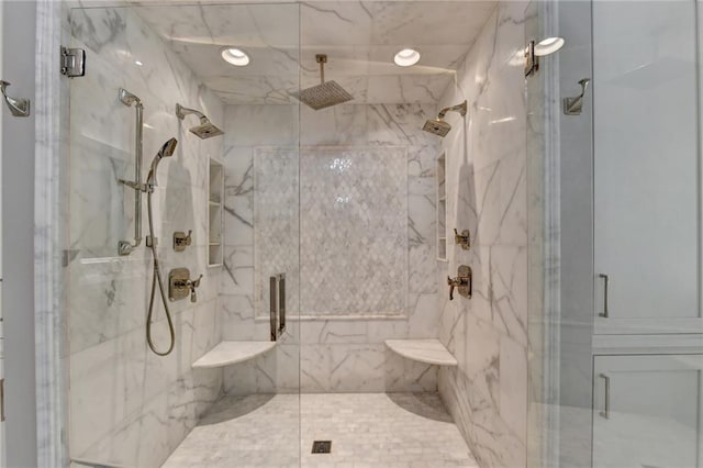 bathroom featuring an enclosed shower