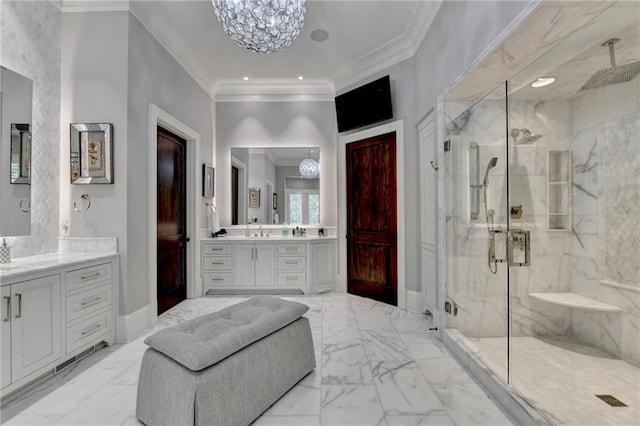 bathroom with an enclosed shower, vanity, ornamental molding, and an inviting chandelier