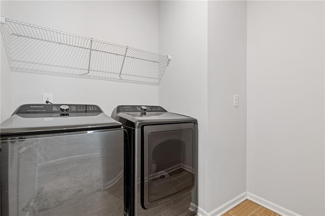 laundry area featuring washing machine and dryer