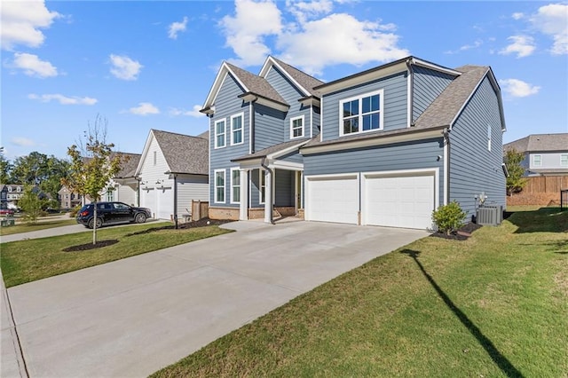 view of front of home featuring a front yard, central AC unit, and a garage