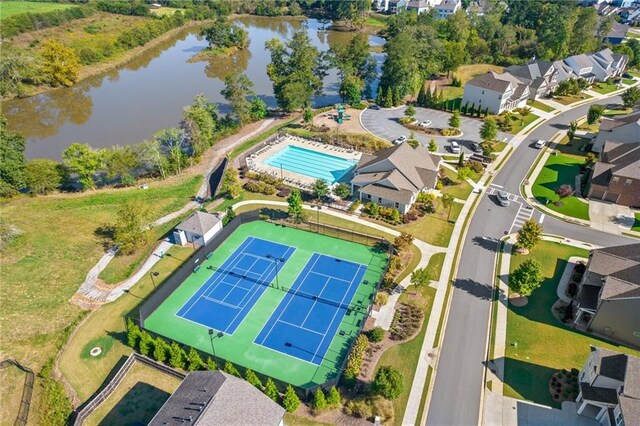 bird's eye view with a water view