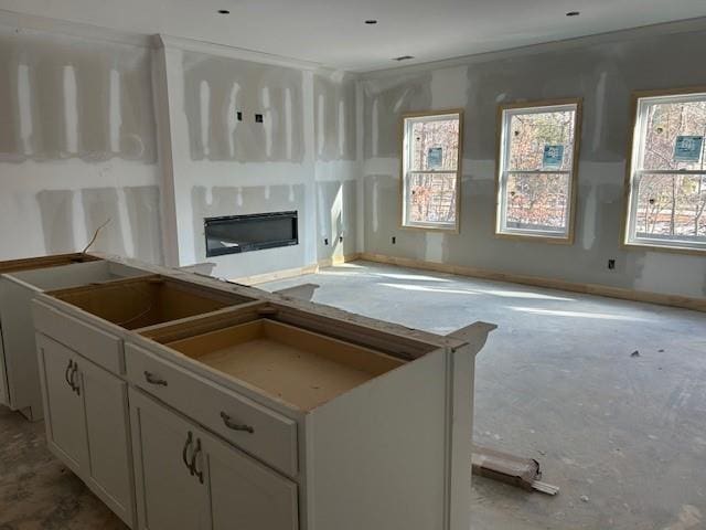 kitchen featuring white cabinetry