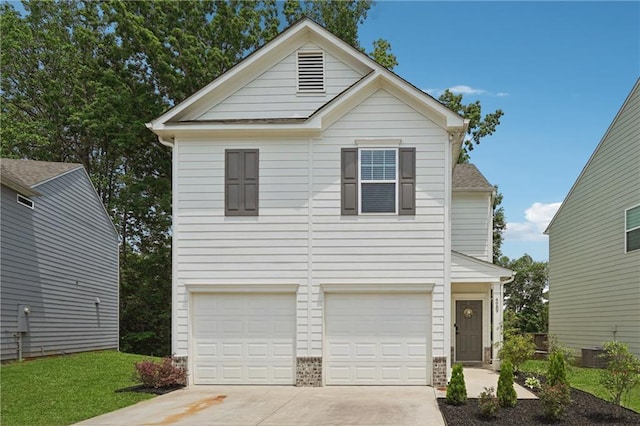 4989 Fawnwood Dr, Gainesville, GA 30504 - traditional-style house with driveway, an attached garage, and central AC