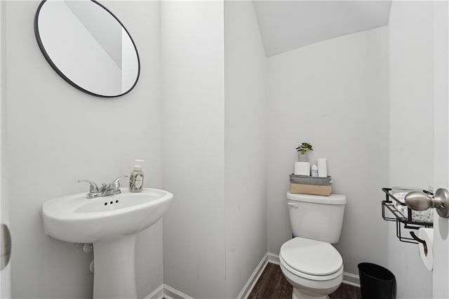 4989 Fawnwood Dr, Gainesville, GA 30504 - half bathroom featuring toilet, wood finished floors, baseboards, and a sink