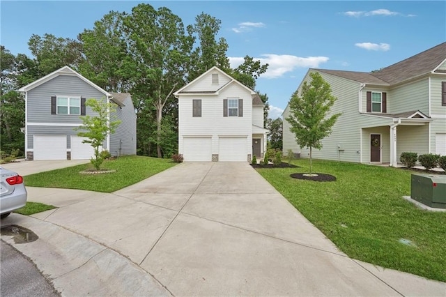 4989 Fawnwood Dr, Gainesville, GA 30504 - traditional-style home featuring a garage, concrete driveway, and a front lawn