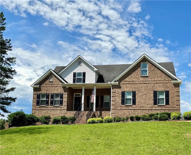 8967 Midlothian Ct, Winston, GA 30187 - craftsman-style home with brick siding, covered porch, and a front lawn