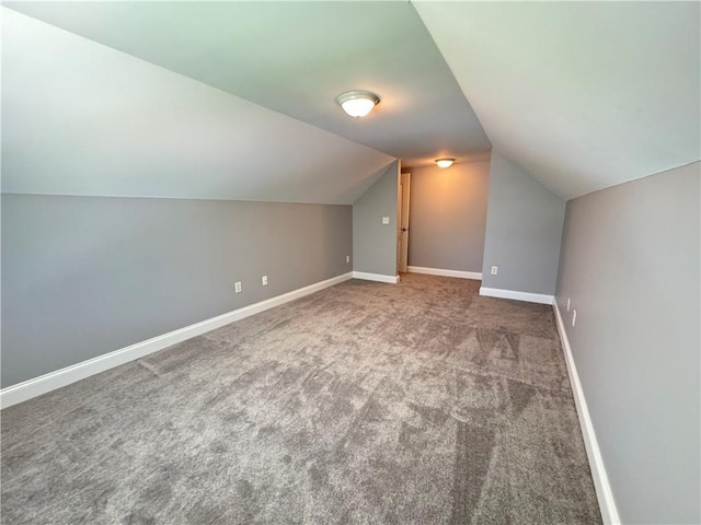 8967 Midlothian Ct, Winston, GA 30187 - additional living space featuring lofted ceiling, carpet, and baseboards