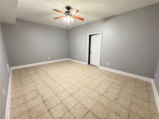 8967 Midlothian Ct, Winston, GA 30187 - empty room featuring ceiling fan and baseboards