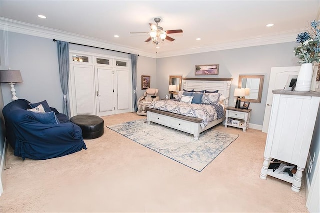 bedroom featuring recessed lighting, light colored carpet, ornamental molding, and a ceiling fan