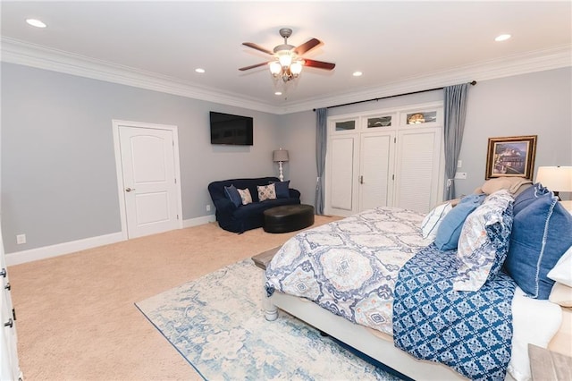 bedroom with carpet flooring, recessed lighting, crown molding, and baseboards