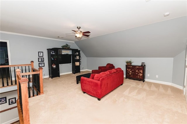 living room with baseboards, carpet floors, and a ceiling fan