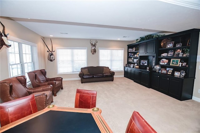 carpeted living area with recessed lighting, visible vents, and baseboards