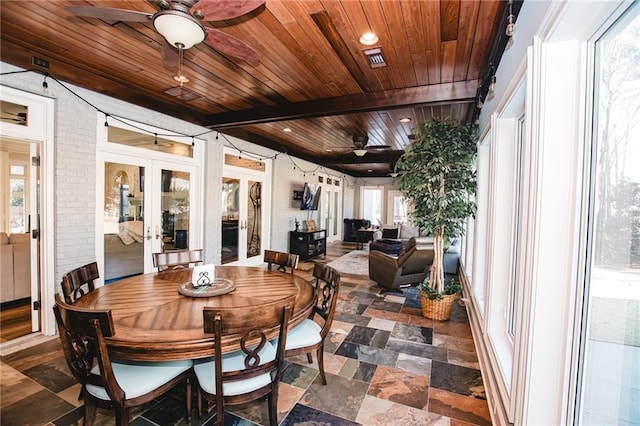 sunroom with visible vents, wood ceiling, beam ceiling, french doors, and a ceiling fan